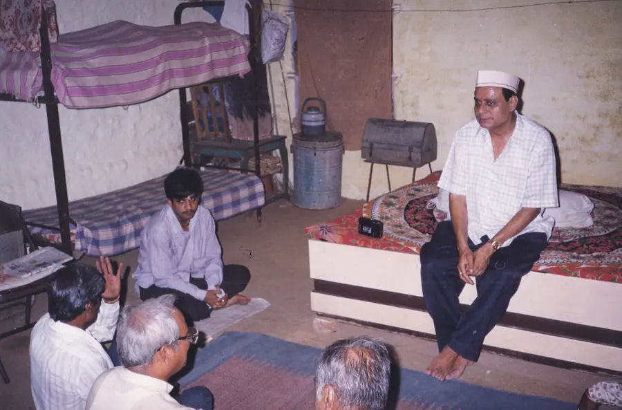 Datta Kaka with devotees or family during Ram-Nam gatherings. Archive still DPK_0068.