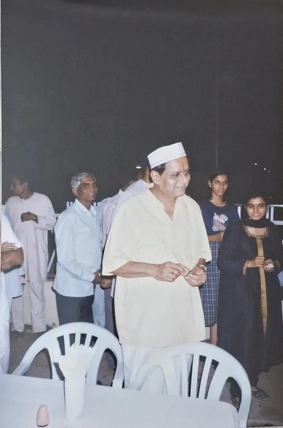 Datta Kaka with devotees or family during Ram-Nam gatherings. Archive still DPK_P1.45.